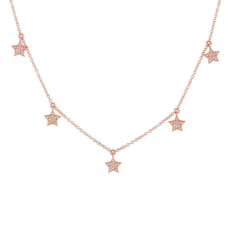 Rose gold star pendant necklace encrusted with small diamonds from our luxury jewelry collection.