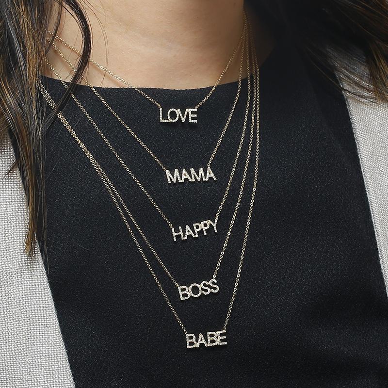 Layered necklaces with LOVE, MAMA, HAPPY, BOSS, and BABE pendants from our jewelry collection. Stylish accessories for every personality.