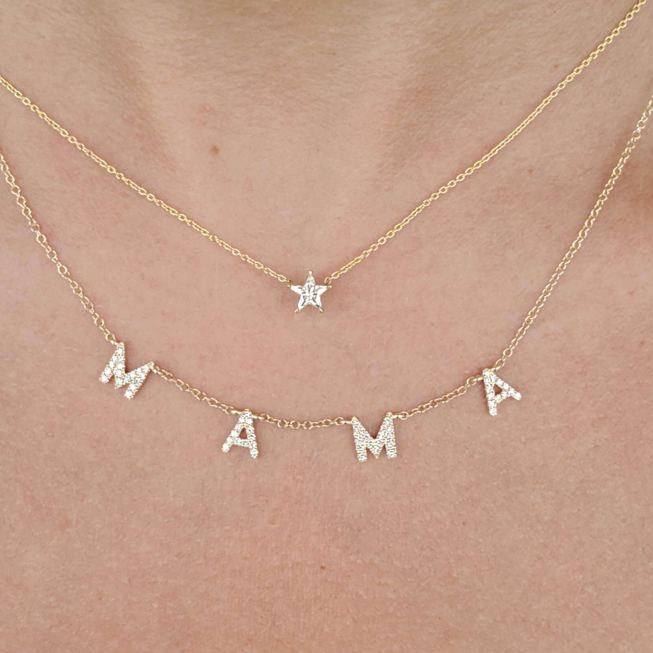 Diamond Pave Mama Station Statement Necklace showcasing a central 'MAMA' adorned with diamonds in 14k gold.