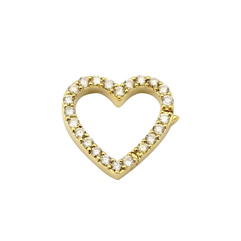 Gold heart-shaped pendant with sparkling diamonds from our luxury jewelry collection.