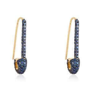 Elegant gold earrings adorned with blue gemstones from our luxury jewelry collection.