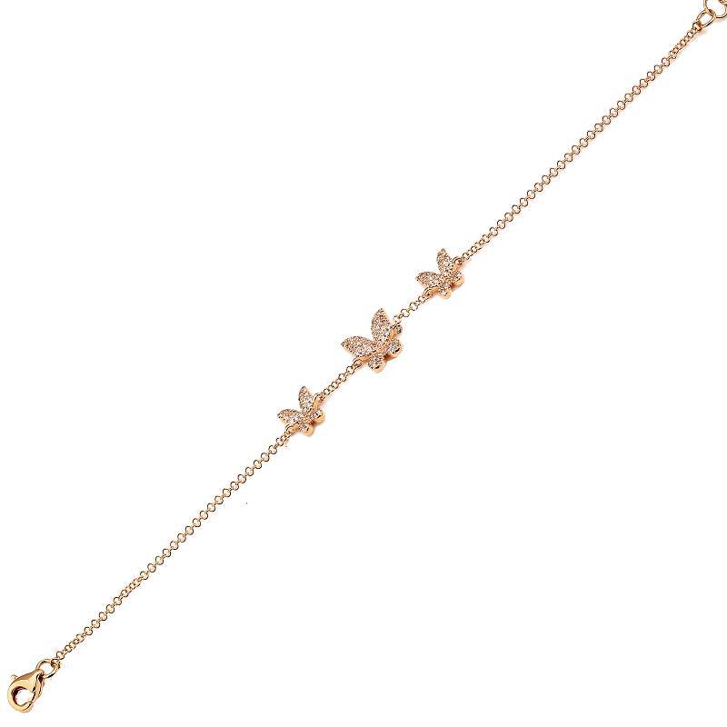 Delicate gold bracelet with butterfly charms encrusted with diamonds by our jewelry brand