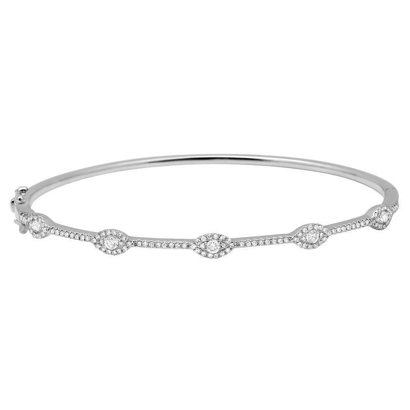 Elegant silver bangle bracelet with diamond accents handcrafted by our jewelry brand.