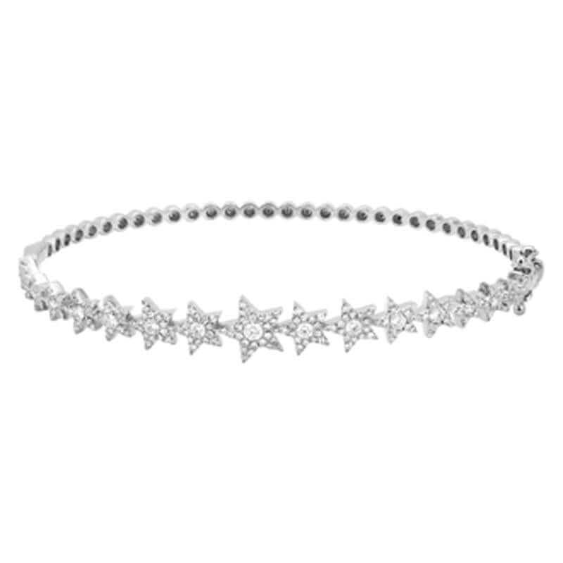 Elegant star-themed bracelet with sparkling diamonds by our jewelry brand. Perfect for adding a touch of glamour to any outfit.