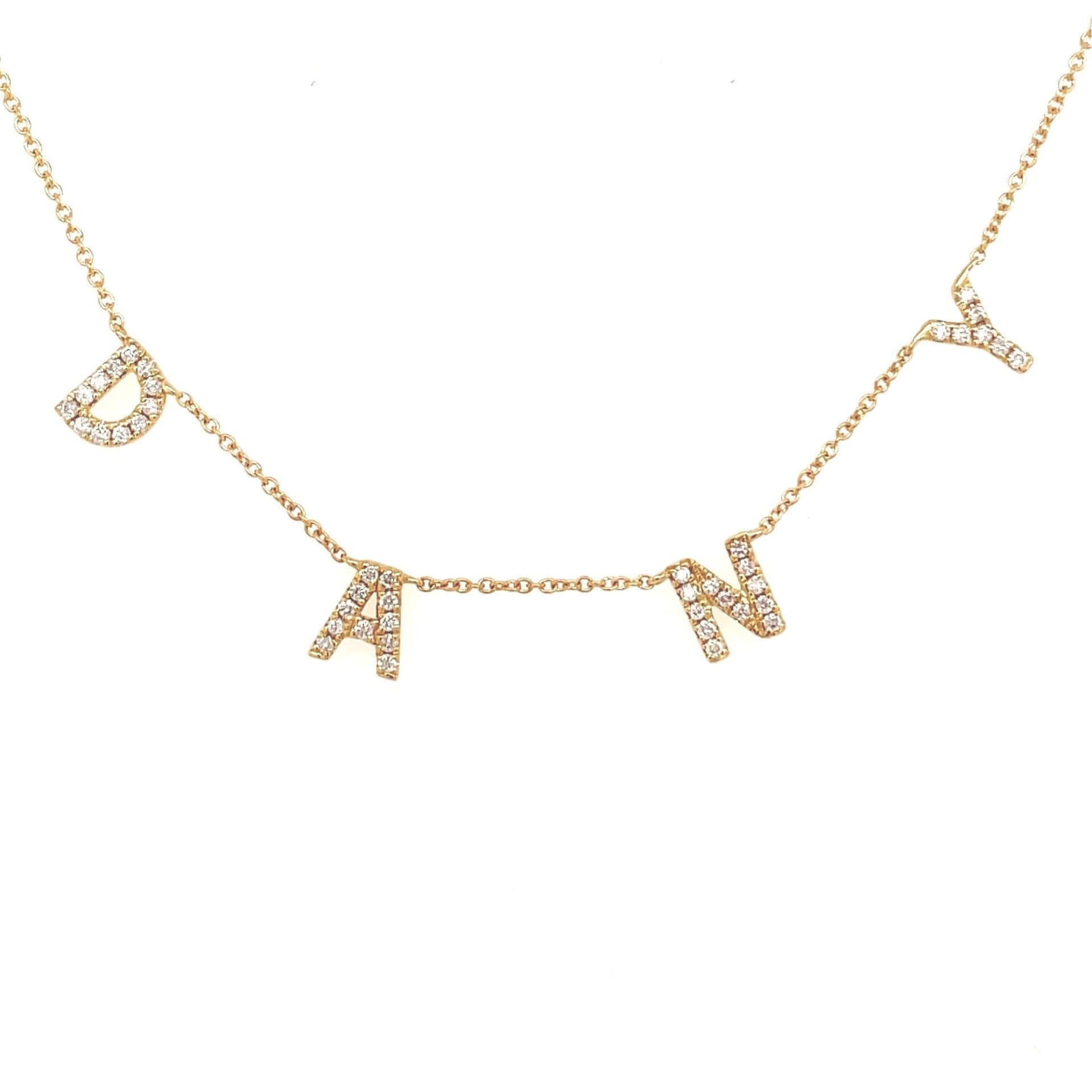 Sparkling gold necklace with personalized letter charms spelling "DANI," perfect for adding a custom touch to your jewelry collection.