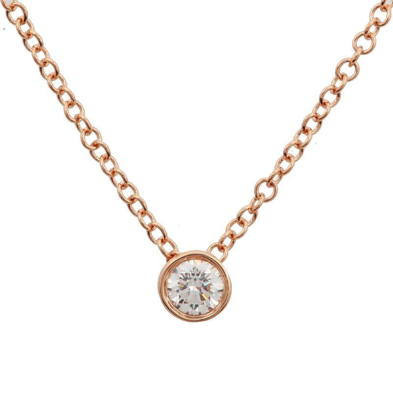 Rose gold necklace with solitaire diamond pendant from our exclusive jewelry collection. Perfect for adding a touch of elegance to any outfit.