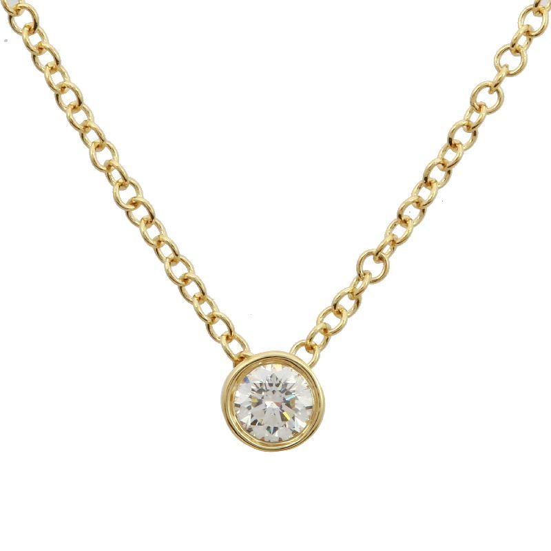 Gold chain necklace featuring a brilliant-cut diamond pendant.
