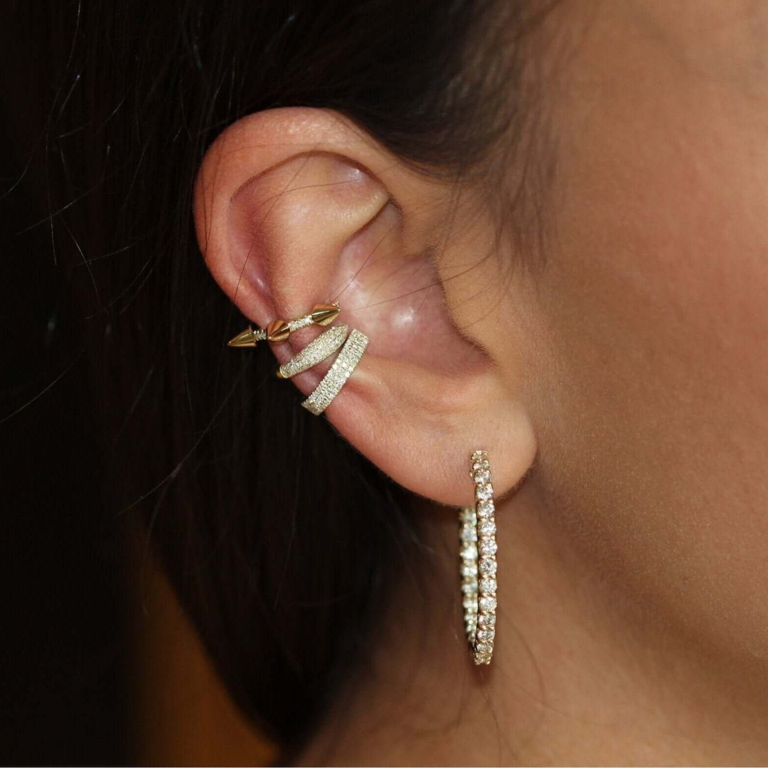 Spike Micro Pave Diamond Ear Cuff styled with gold jewelry for a modern and elegant ear design by Izakov Fine Jewelry.
