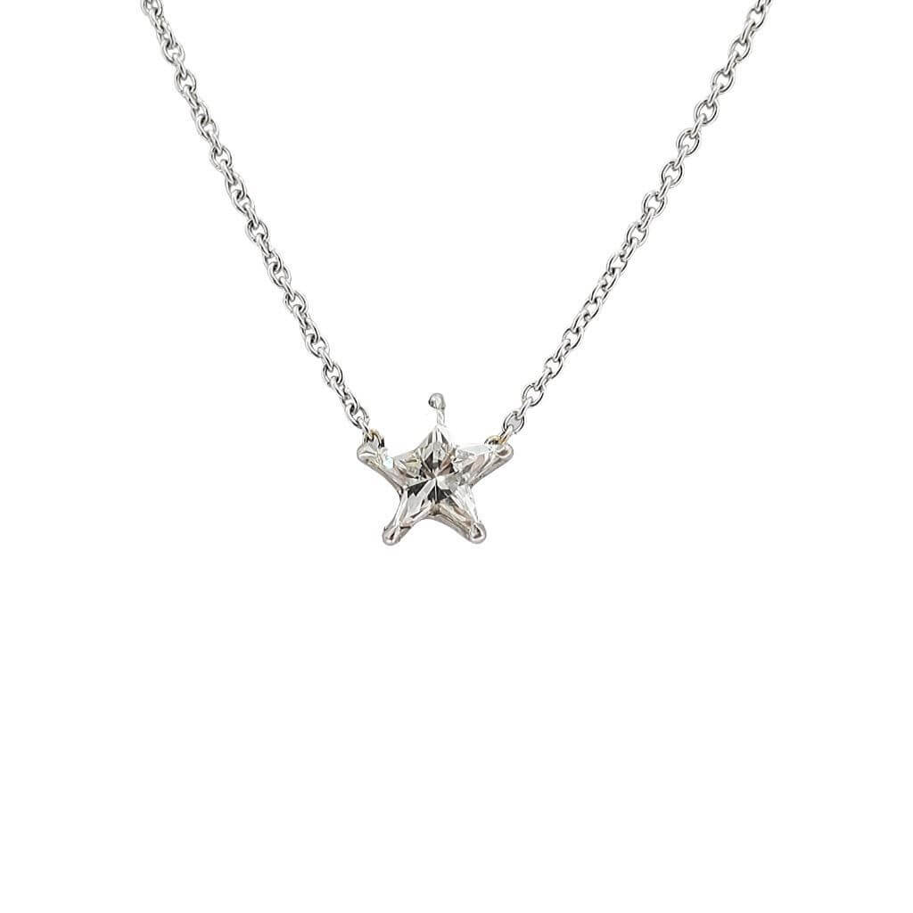Elegant star-shaped pendant necklace from our jewelry brand, featuring a finely detailed silver star with a delicate chain.
