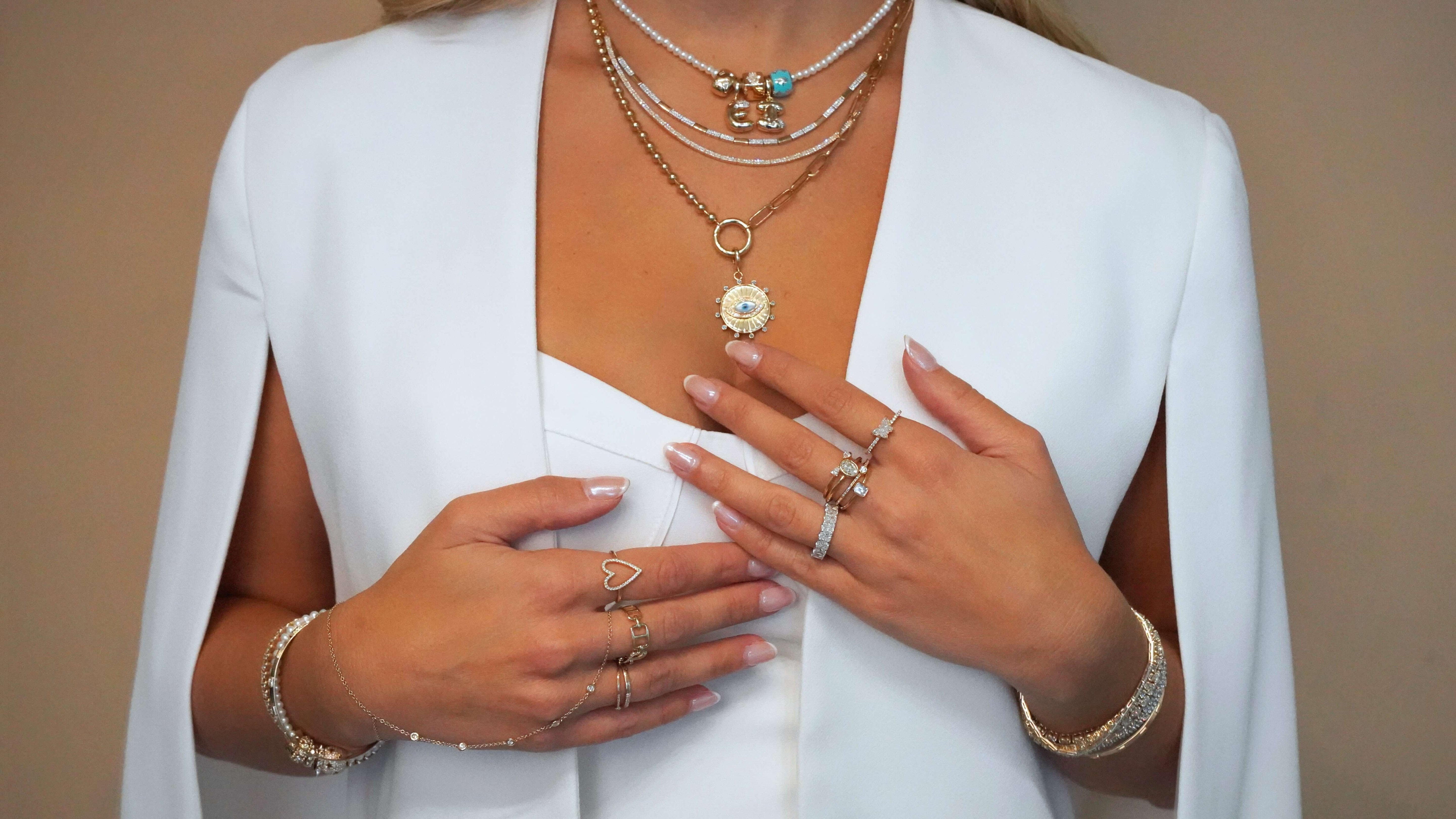 Beautiful jewelry collection displayed during the Black Friday Event, showcasing necklaces and rings.