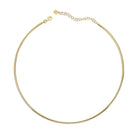 Omega Wire Gold Choker Necklace from Izakov Fine Jewelry, a sleek and durable 14K gold piece for layering.