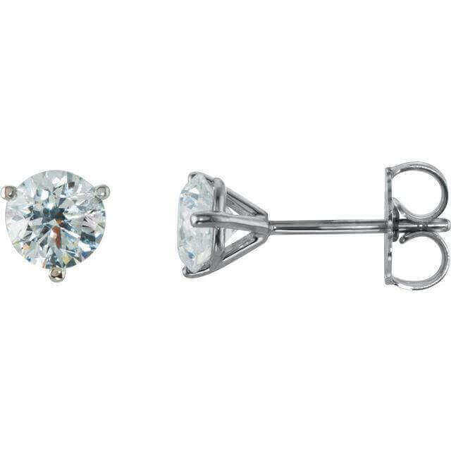 Elegant diamond stud earrings set in sterling silver for a timeless jewelry accessory.