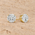 Classic Round Lab-Grown Diamond Stud Earrings in 14K yellow gold, styled, Izakov Fine Jewelry