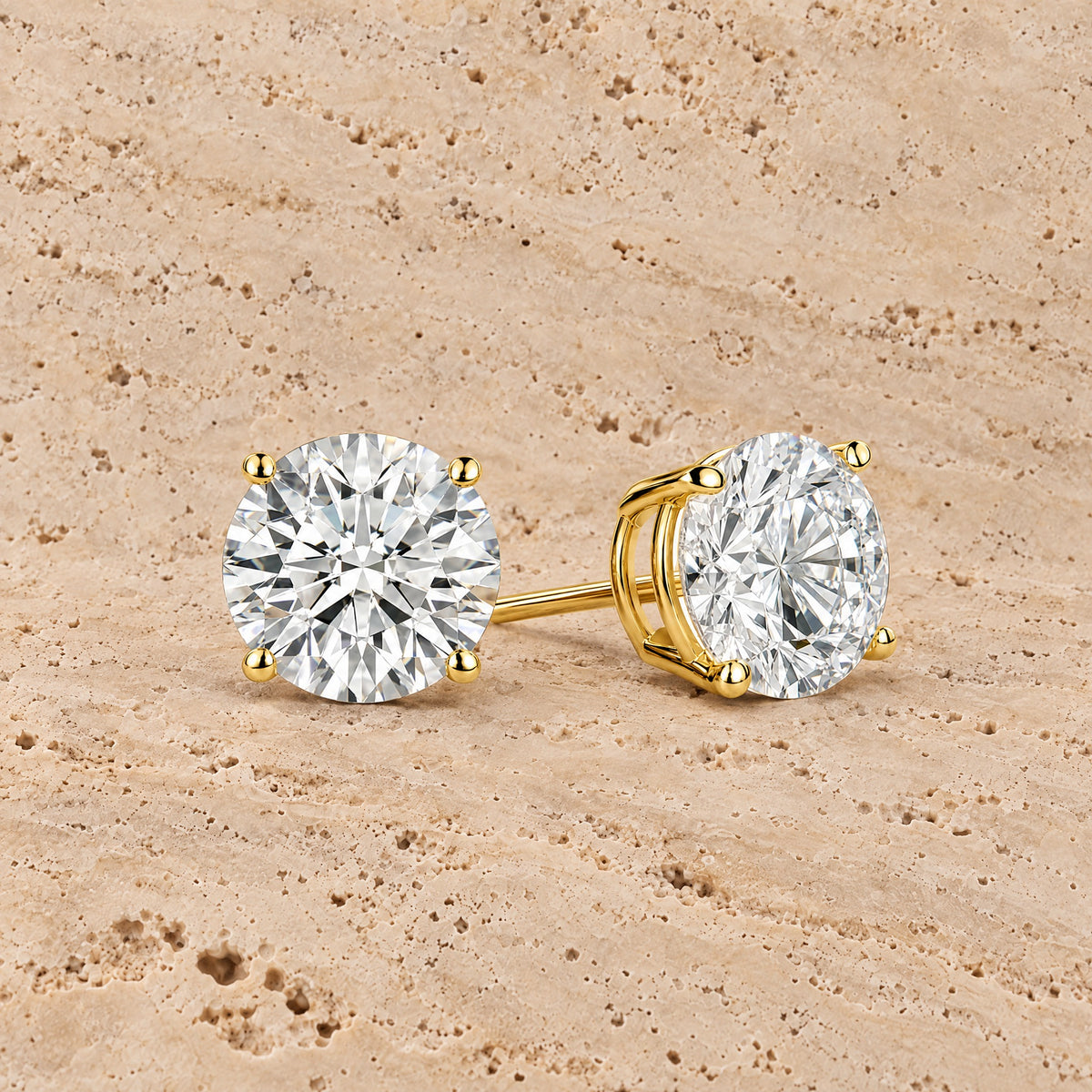 Classic Round Lab-Grown Diamond Stud Earrings in 14K yellow gold, styled, Izakov Fine Jewelry