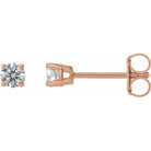 Rose gold diamond stud earrings showcasing a sparkling round diamond in a classic four-prong setting, perfect for any occasion.