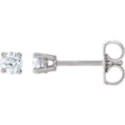 Sterling silver diamond stud earrings, elegant and timeless jewelry piece from our exclusive collection.