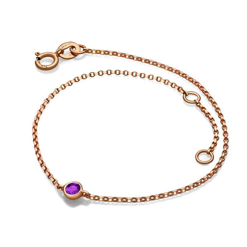 Elegant rose gold chain bracelet with purple gemstone from our premium jewelry collection