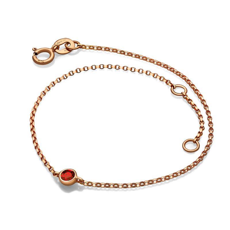 Elegant rose gold bracelet with a red gemstone from our premium jewelry collection