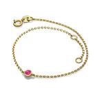 Elegant gold bracelet with a ruby gemstone from our luxury jewelry collection