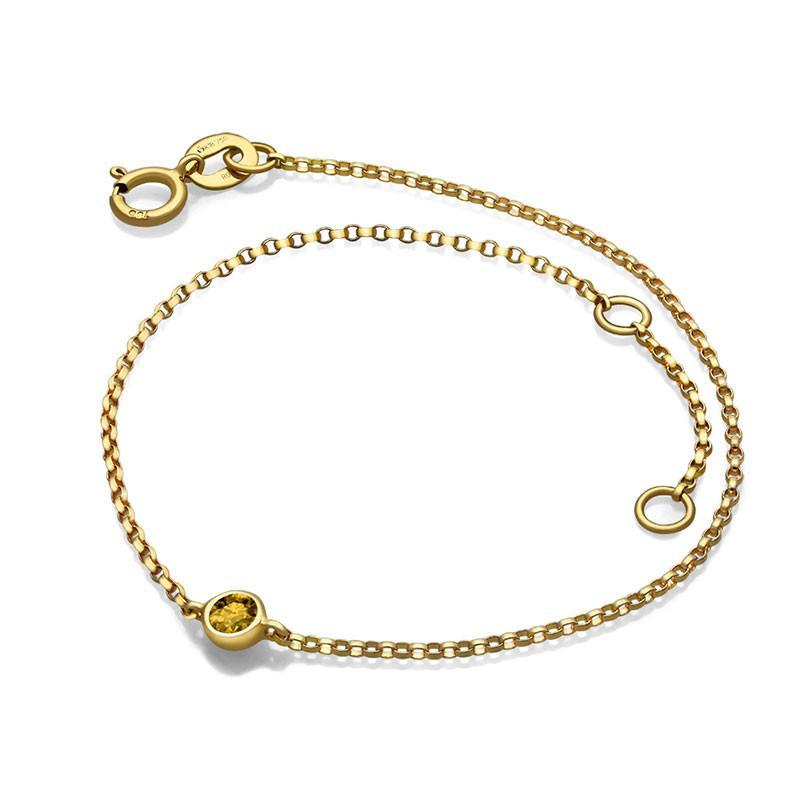 Elegant gold bracelet with simple chain design and circular charm from [Your Jewelry Brand]