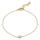 Delicate gold chain bracelet with single pearl by our jewelry brand