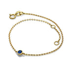 Elegant gold bracelet with blue gemstone from our exclusive jewelry collection