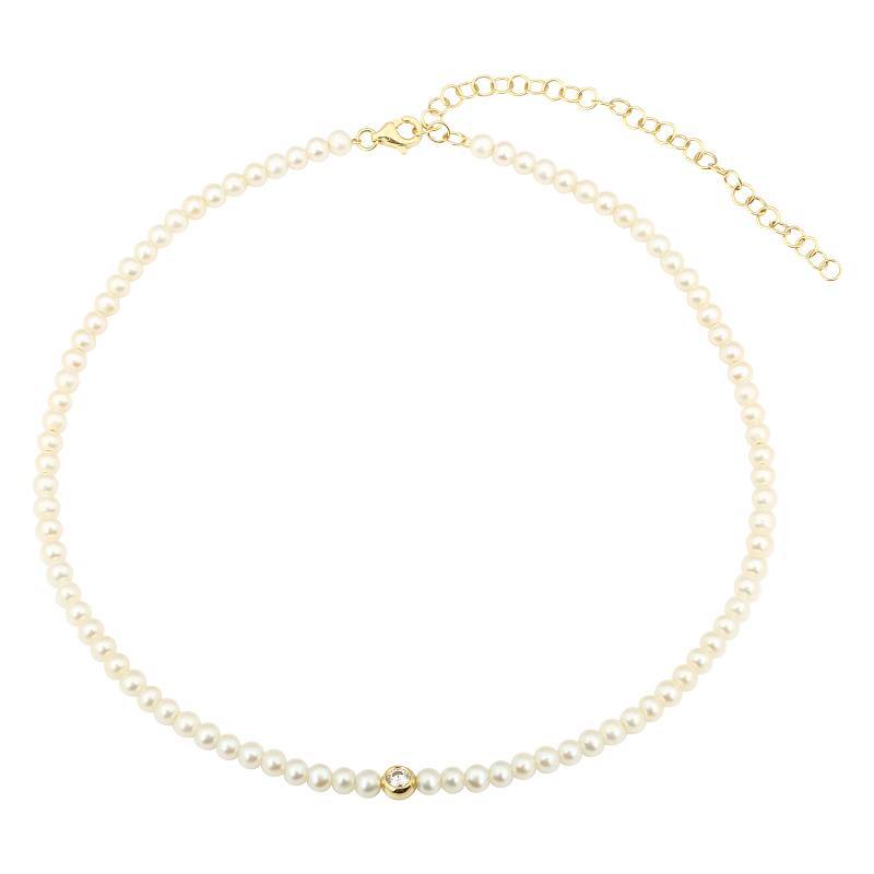 Elegant pearl necklace with gold clasp and adjustable chain, perfect for adding a touch of sophistication to any outfit.