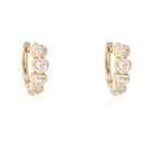 Elegant gold earrings with heart-shaped diamonds from our jewelry collection. Perfect for a sophisticated look.