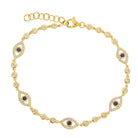 Bezel Station Evil Eye Diamond Bracelet featuring sapphire and diamond accents in a gold setting.