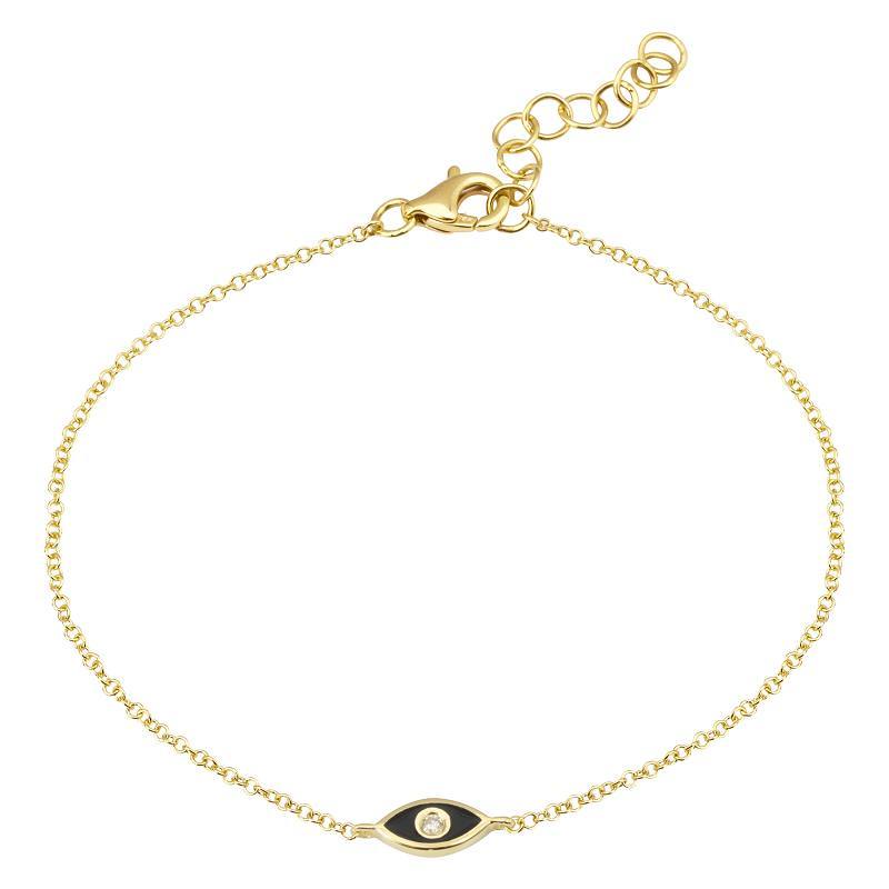 Delicate gold chain bracelet with an elegant black and gold evil eye charm by our jewelry brand.