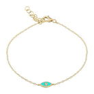 Gold evil eye bracelet with turquoise and diamond accents from our jewelry collection.