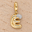 Bubble Letter Diamond Necklace Charm in 14K yellow gold, styled, Izakov Fine Jewelry