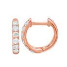 Classic Pave Diamond Huggies in 14K gold with round diamonds by Izakov Fine Jewelry.