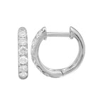 Classic Pave Diamond Huggies in 14K gold featuring sparkling round diamonds by Izakov Fine Jewelry.