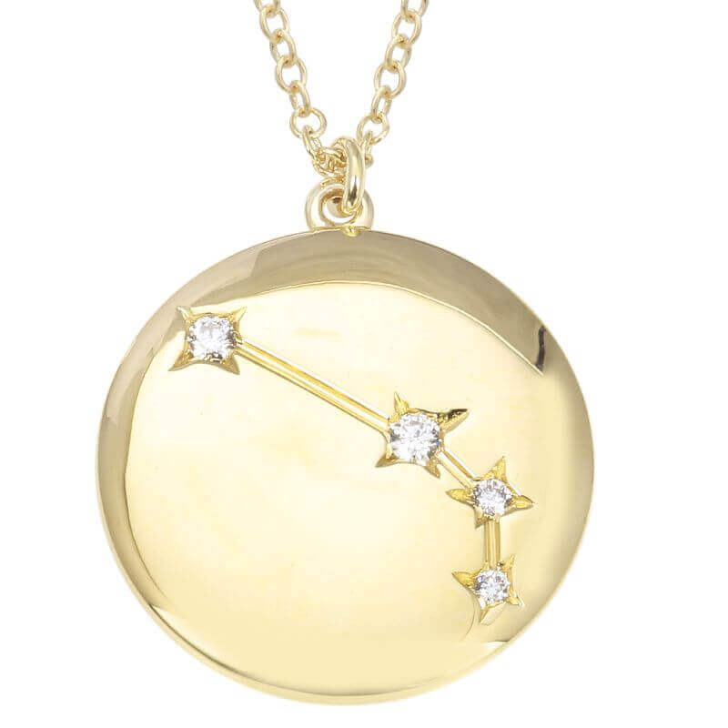 Gold constellation pendant necklace with diamond accents, elegant celestial jewelry from our luxury collection