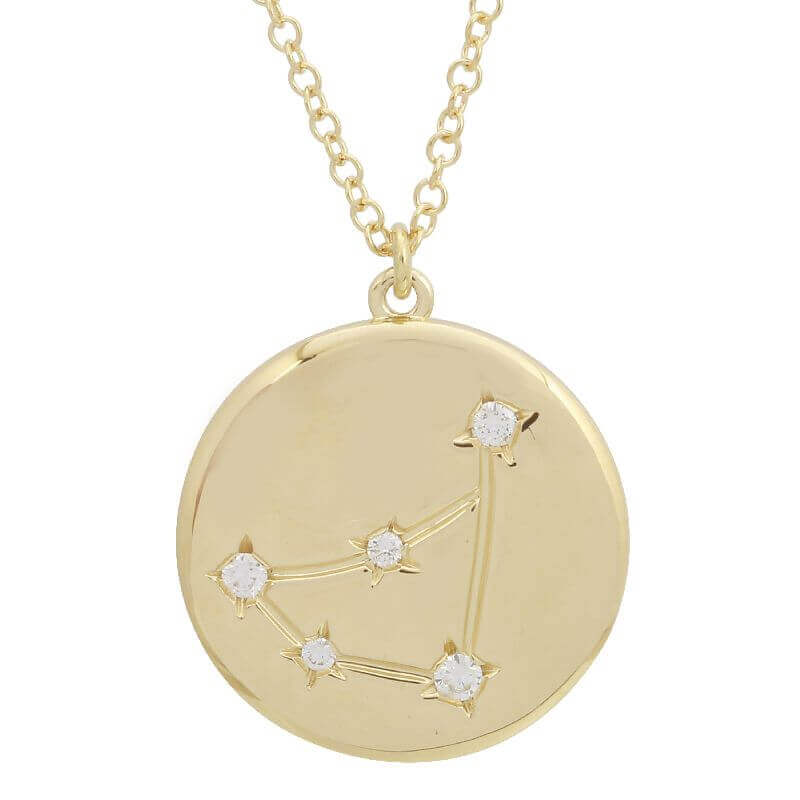 Zodiac constellation charm necklace in gold with diamond accents by our jewelry brand. Elegant astrology-inspired pendant for personalized style.