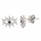 Unique evil eye stud earrings with blue gemstone and diamond accents.