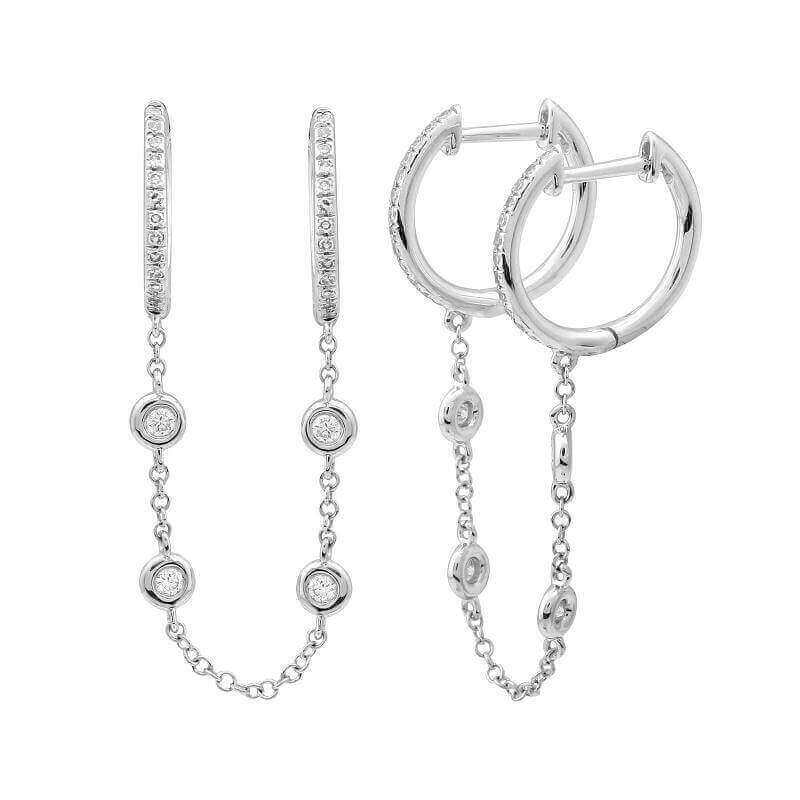 Elegant silver hoop earrings with attached chain and sparkling gemstones from our luxury jewelry collection.