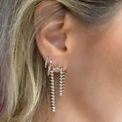 Diamond Bezel Spikes Drop Earrings showcased on a model, highlighting their elegant design and 1.09 carats of diamonds.