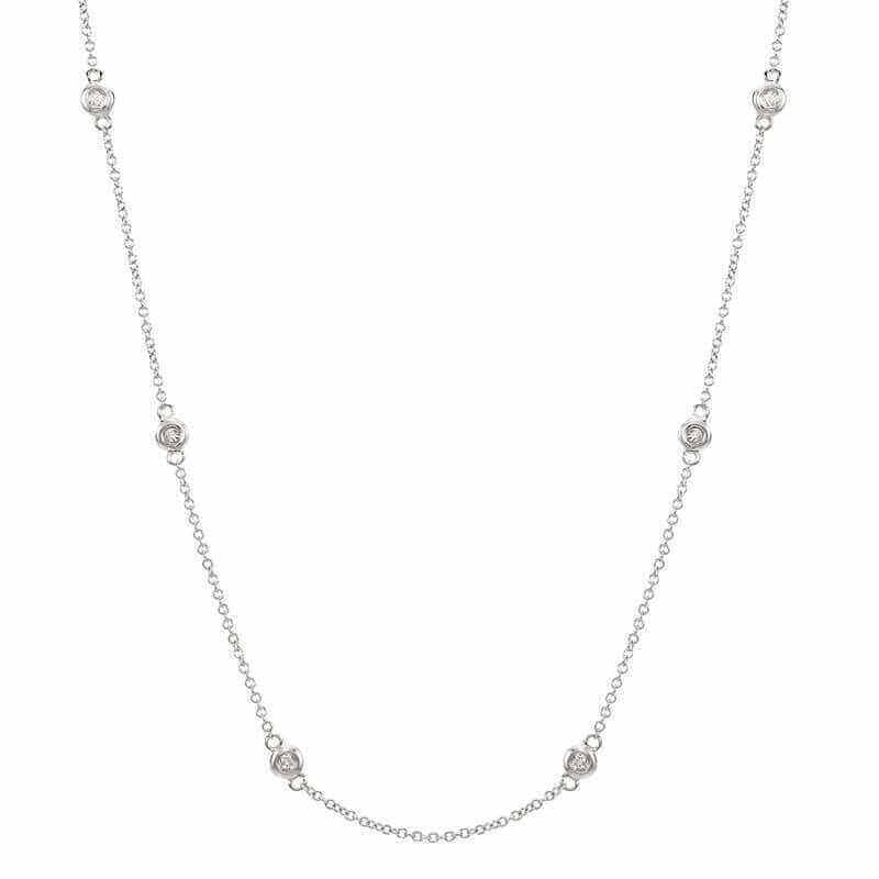 Elegant silver necklace with delicate chain and five sparkling gemstone accents from our jewelry brand collection.