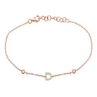 Rose gold bracelet with diamond-studded initial D charm by our jewelry brand