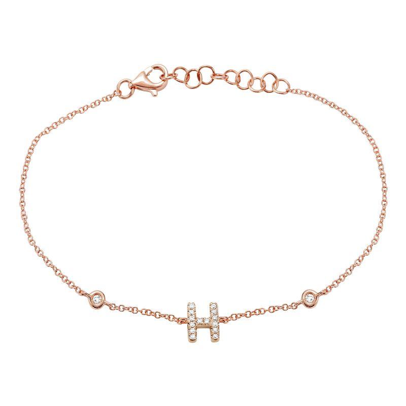 Rose gold bracelet with a diamond-studded "H" charm from our luxury jewelry collection.