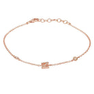 Delicate rose gold bracelet with small pendant and clasp from our jewelry brand collection