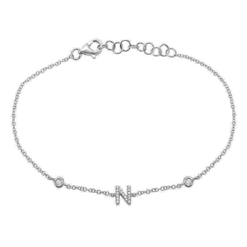 Elegant silver bracelet featuring a delicate chain with a stylish "N" charm, perfect for personalized jewelry lovers.