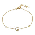 Elegant gold bracelet with a diamond-studded "G" charm from our premium jewelry collection.