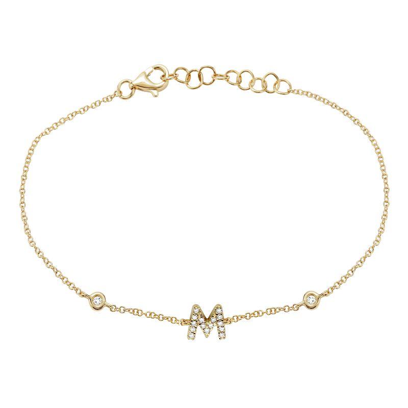 Gold bracelet with diamond-studded 'M' pendant from our luxury jewelry collection