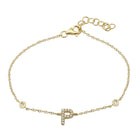 Gold bracelet with letter 'P' pendant and diamond accents from our exclusive jewelry collection