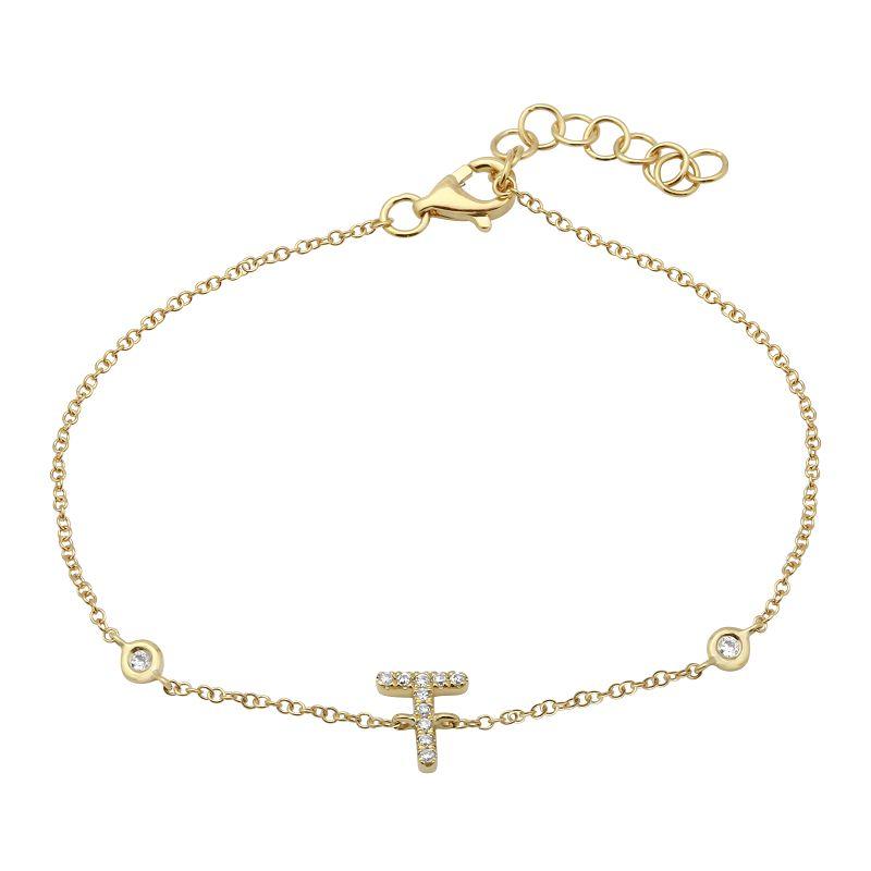 Elegant gold bracelet with a delicate chain and small cross charm, perfect for our jewelry brand's sophisticated and unique collection