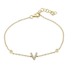 Elegant gold bracelet with V-shaped diamond pendant by our jewelry brand