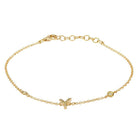 Elegant gold chain bracelet with delicate charms and secure clasp from our luxury jewelry collection.